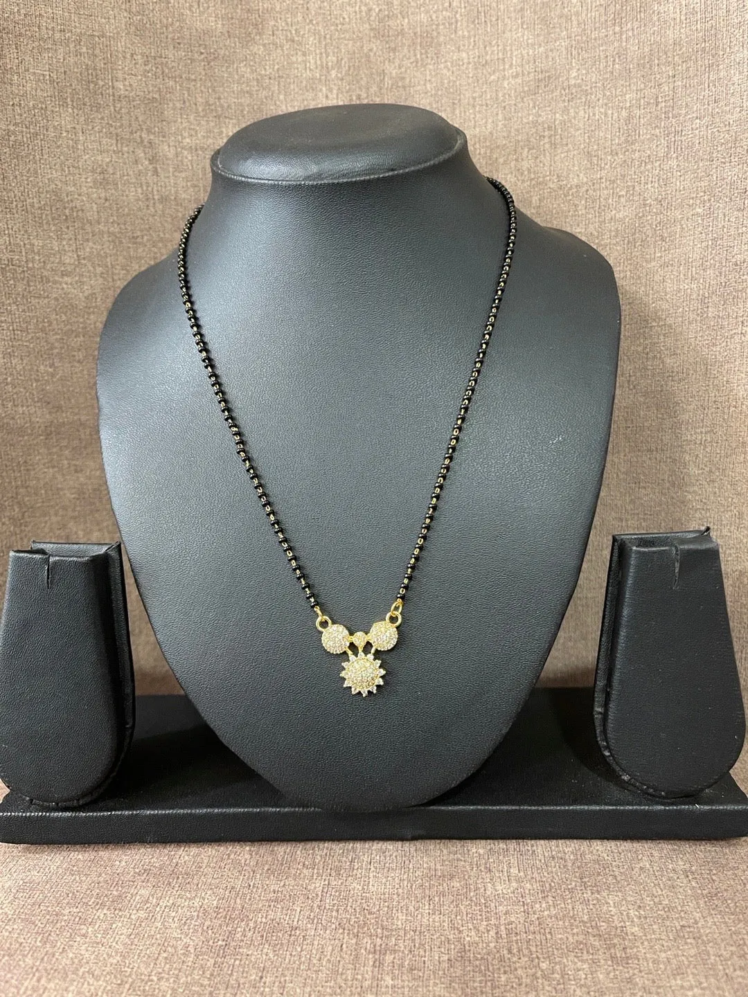 American Diamond Short Mangalsutra Designs Fancy Flower Pendant Simple Black Beads Chain